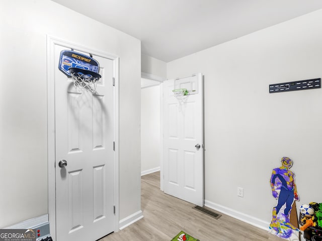 interior space with light hardwood / wood-style flooring