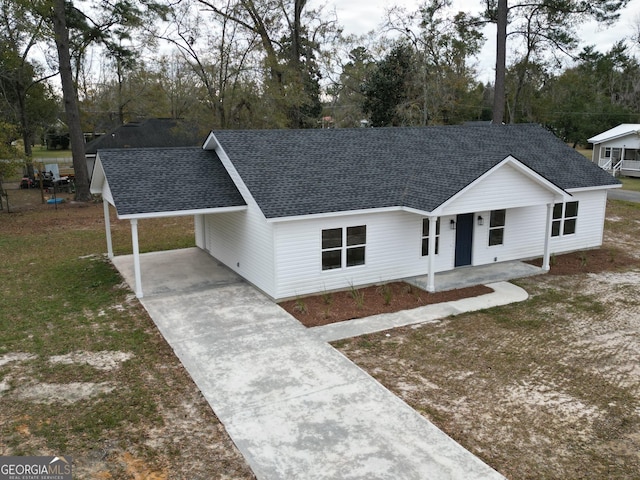 view of front of house with a carport