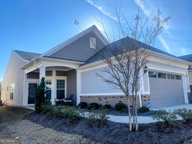 view of front of home with a garage