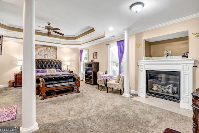 bedroom with ornate columns, visible vents, carpet flooring, and ornamental molding