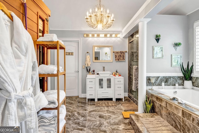 full bath featuring decorative columns, a shower stall, vanity, and a bath