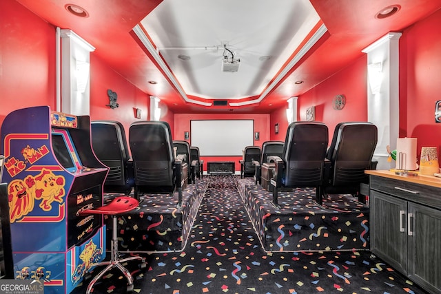 carpeted home theater featuring a raised ceiling and recessed lighting