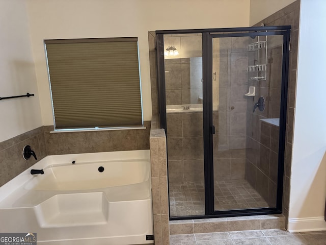 bathroom with tile patterned flooring and plus walk in shower