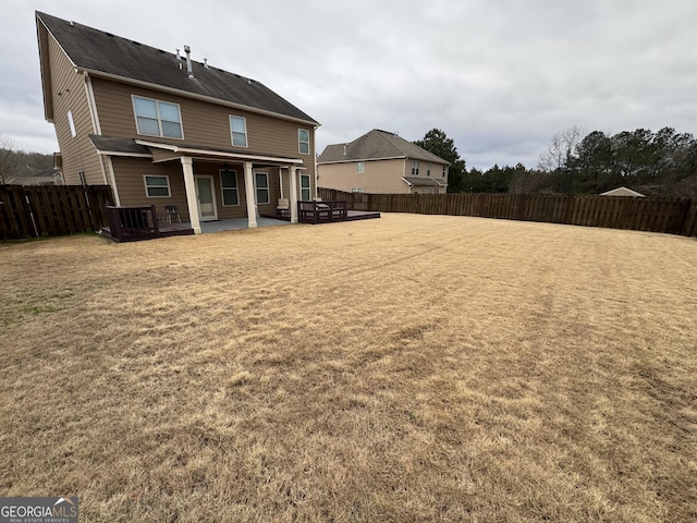 back of property featuring a patio