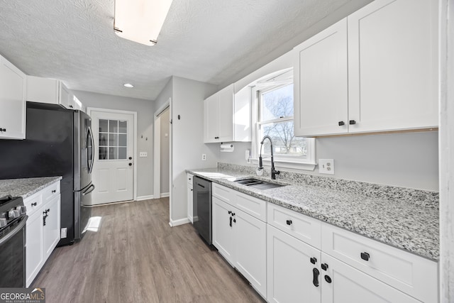 kitchen with white cabinets and sink