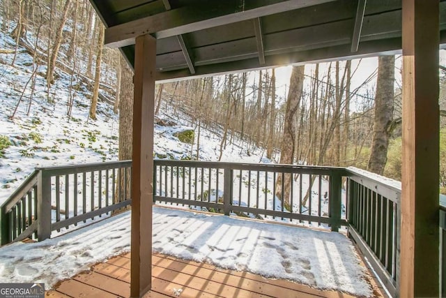 view of snow covered deck