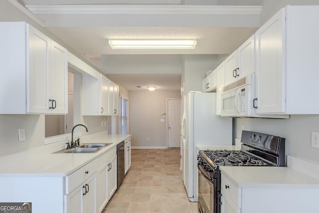 kitchen with sink, white cabinetry, and black appliances