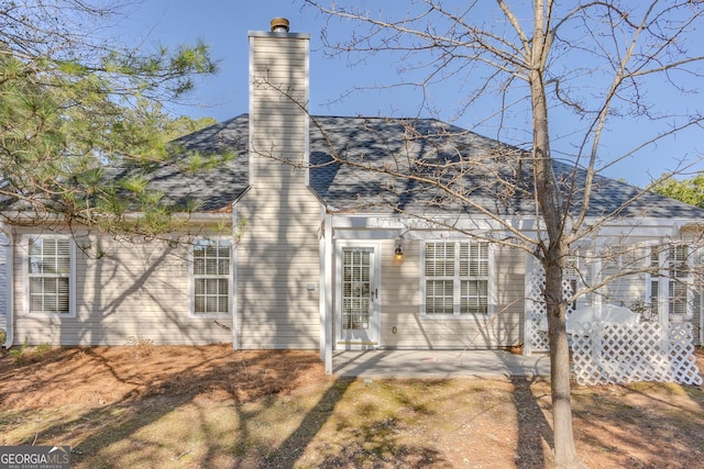 rear view of house featuring a patio area