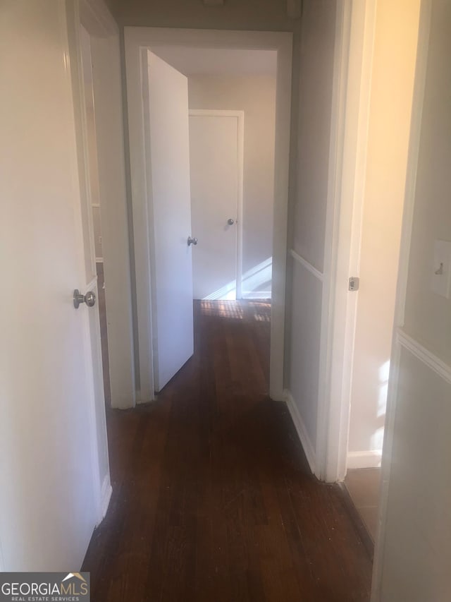 hall featuring dark hardwood / wood-style floors