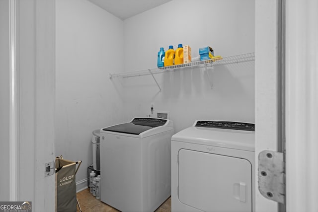 laundry area with separate washer and dryer