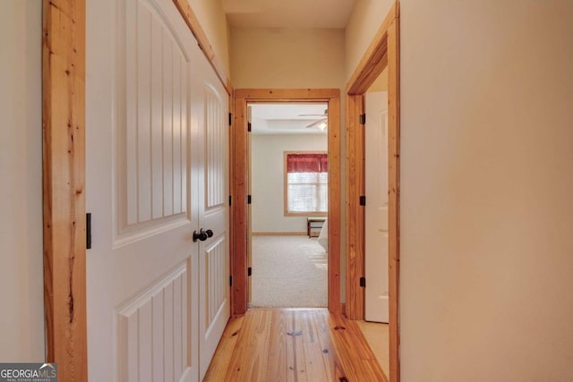 hall with light wood-type flooring