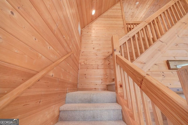 stairway with wooden walls