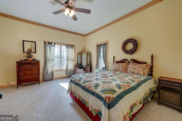 bedroom featuring light carpet, ceiling fan, and ornamental molding