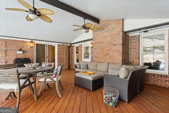 wooden terrace featuring an outdoor hangout area and ceiling fan