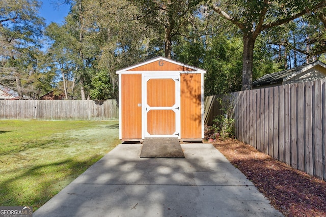 view of outdoor structure with a yard