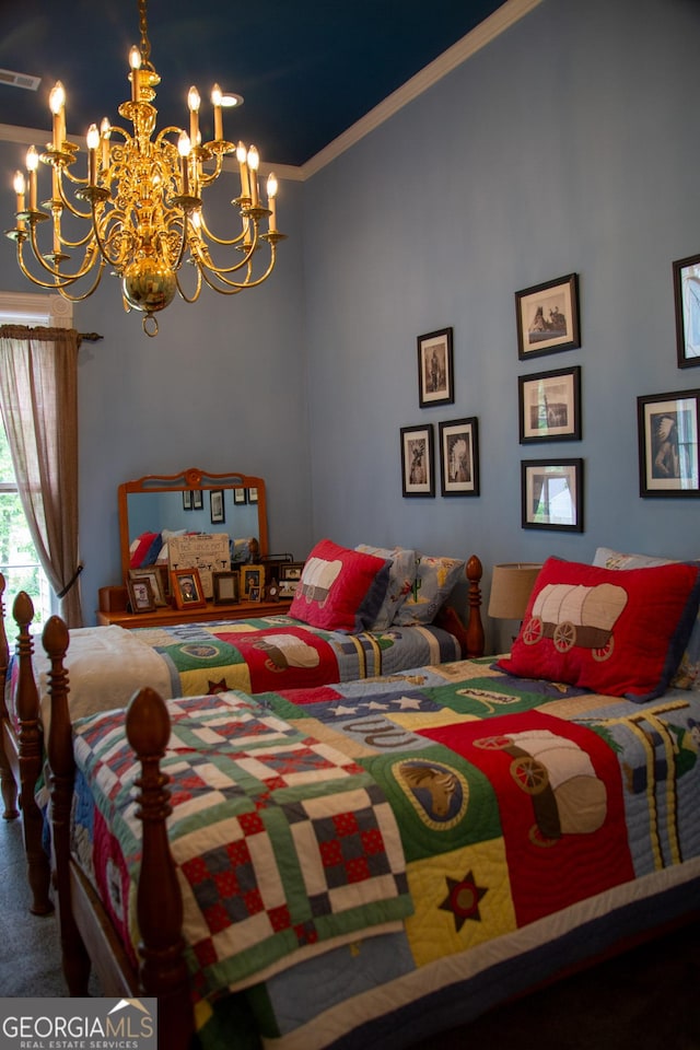 bedroom with a chandelier, ornamental molding, and carpet floors