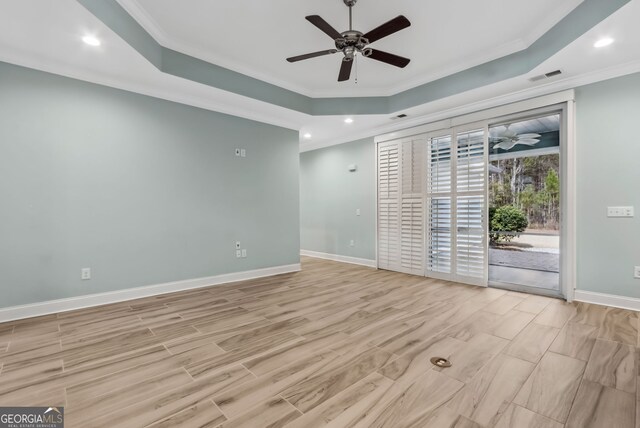 kitchen with a ceiling fan, a sink, appliances with stainless steel finishes, and crown molding