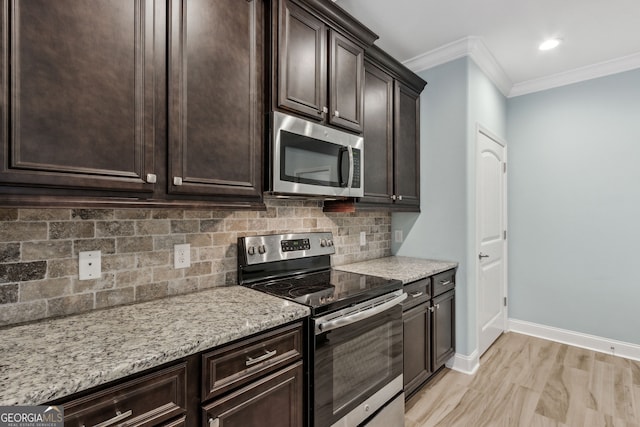 kitchen with visible vents, a tray ceiling, a sink, and stainless steel dishwasher