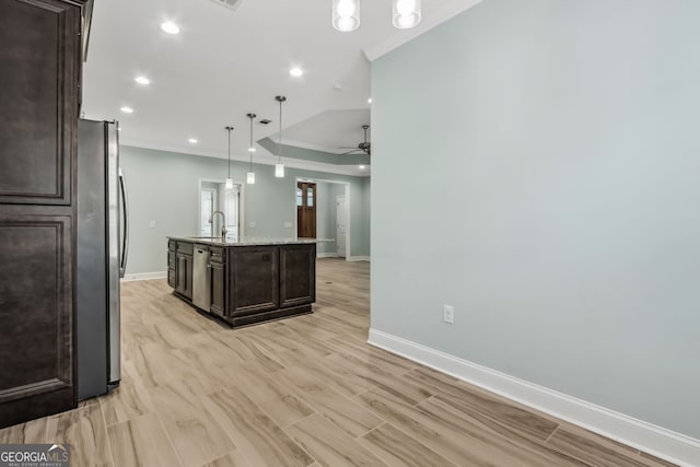 empty room featuring baseboards, a notable chandelier, ornamental molding, and a healthy amount of sunlight