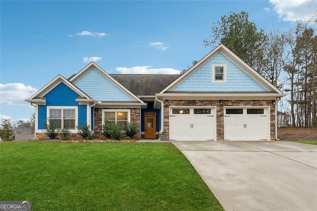 craftsman inspired home featuring a front lawn and a garage