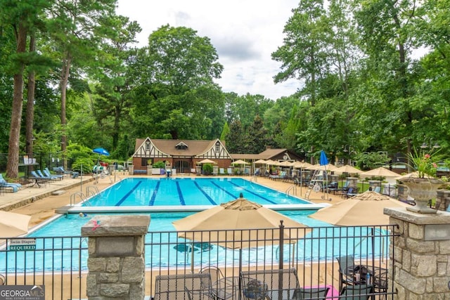 view of swimming pool with a patio area