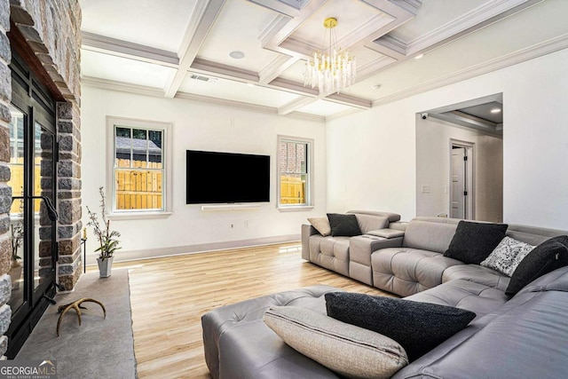 living room with a notable chandelier, beam ceiling, crown molding, coffered ceiling, and hardwood / wood-style flooring