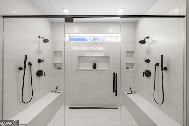 bathroom with a stall shower