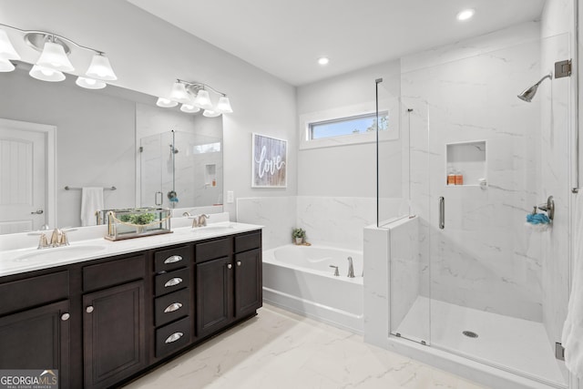 bathroom featuring plus walk in shower and vanity