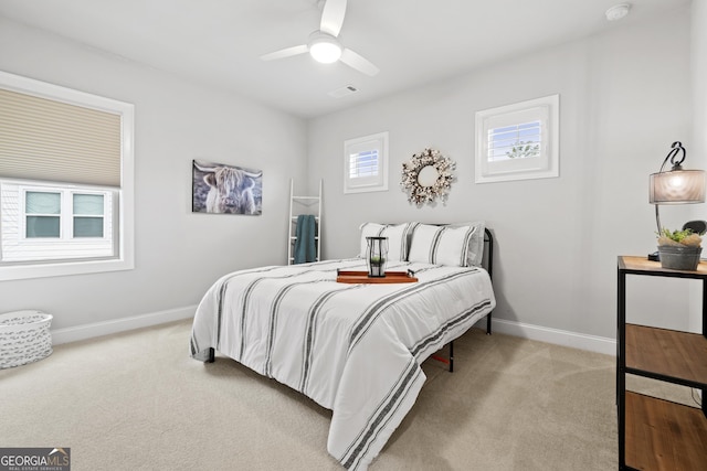 bedroom featuring ceiling fan and carpet flooring