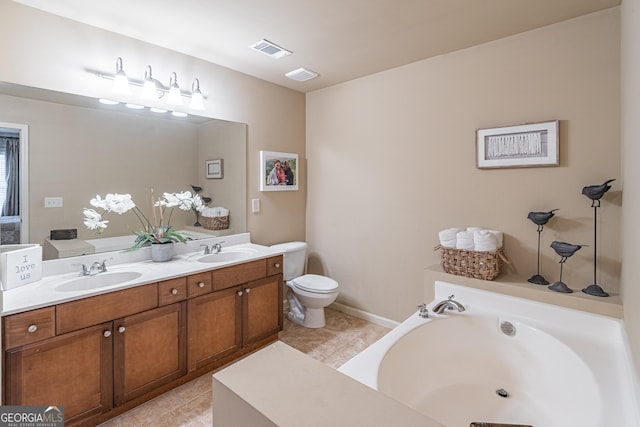 bathroom featuring vanity, tile patterned flooring, a tub, and toilet