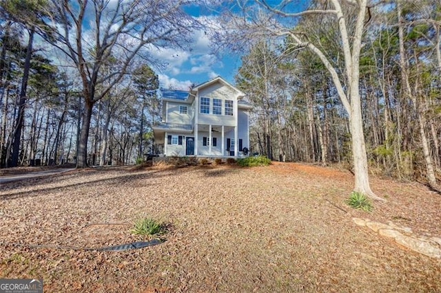 view of front property featuring a porch