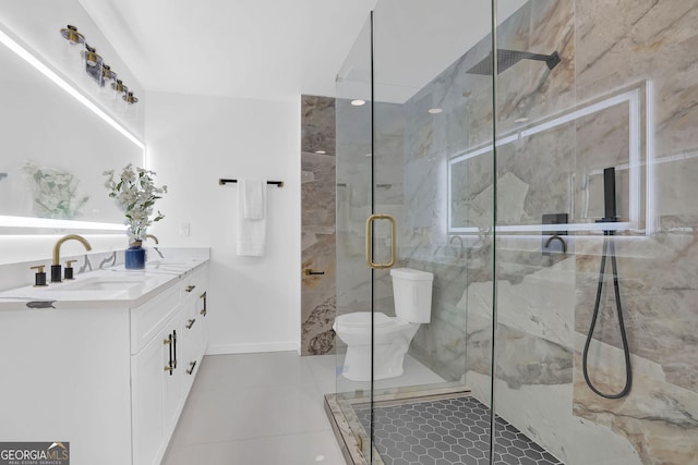 bathroom featuring tile patterned floors, an enclosed shower, vanity, and toilet