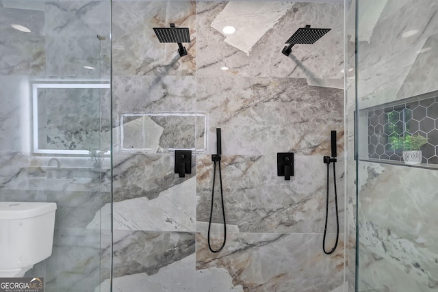 bathroom with a tile shower