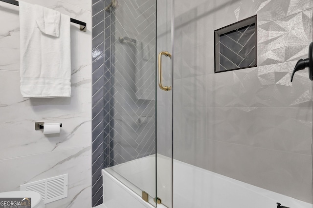 bathroom with an enclosed shower