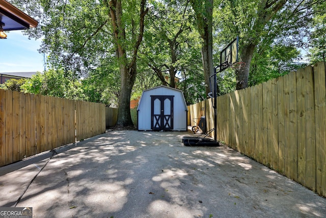 view of patio with a shed