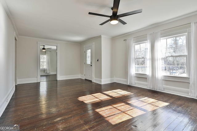 unfurnished room with ceiling fan, dark hardwood / wood-style flooring, and crown molding