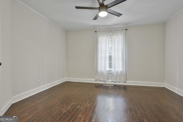 unfurnished room with dark wood-type flooring, ornamental molding, and ceiling fan