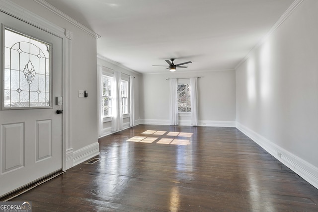 entryway with ceiling fan, dark hardwood / wood-style floors, and crown molding