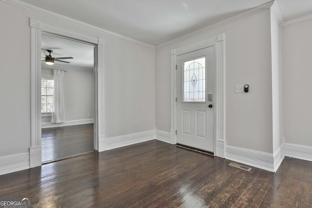 foyer featuring ceiling fan, dark hardwood / wood-style floors, and crown molding