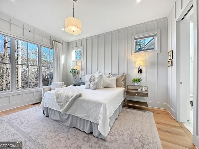 bedroom with light hardwood / wood-style flooring