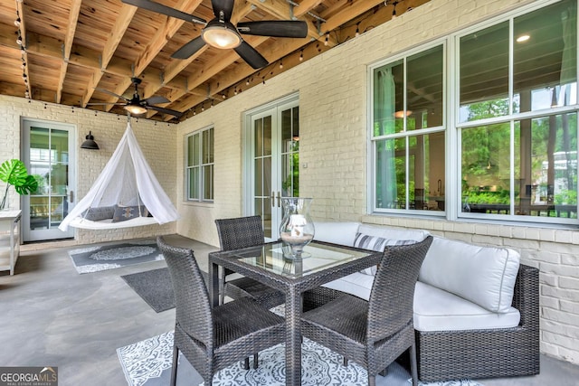 view of patio featuring ceiling fan