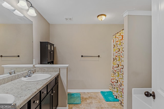 bathroom featuring vanity and a shower with shower curtain