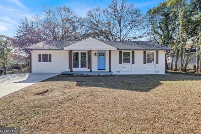 ranch-style home featuring a front yard and a porch