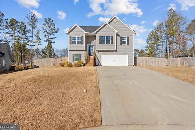 206 Glacier Ct, Carrollton, GA 30117 - bi-level home with driveway and a garage