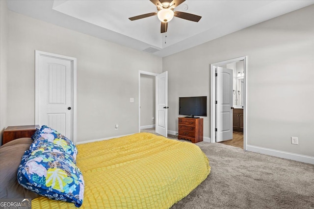 206 Glacier Ct, Carrollton, GA 30117 - carpeted bedroom featuring baseboards, ensuite bathroom, and a ceiling fan