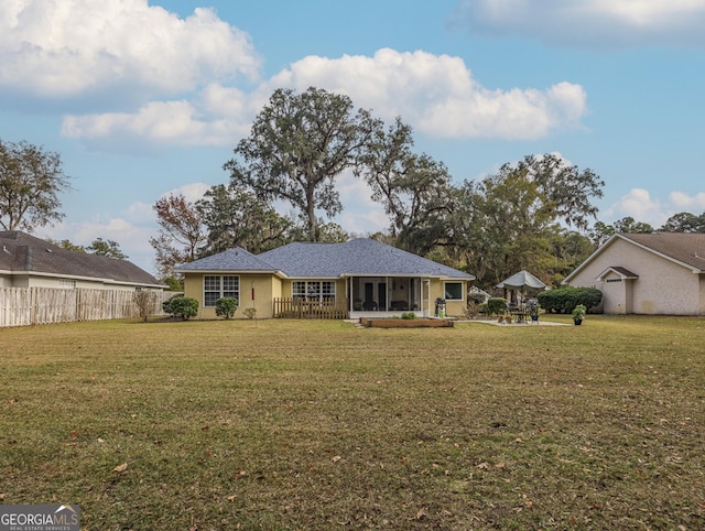 view of front of home with a front lawn