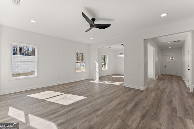 interior space with visible vents, recessed lighting, baseboards, and wood finished floors