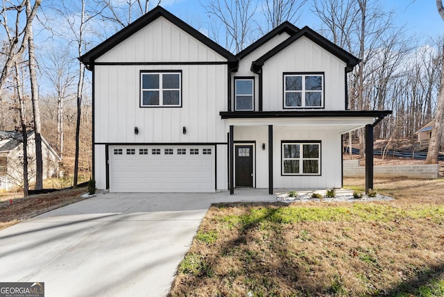 modern farmhouse style home with board and batten siding, covered porch, a garage, and driveway