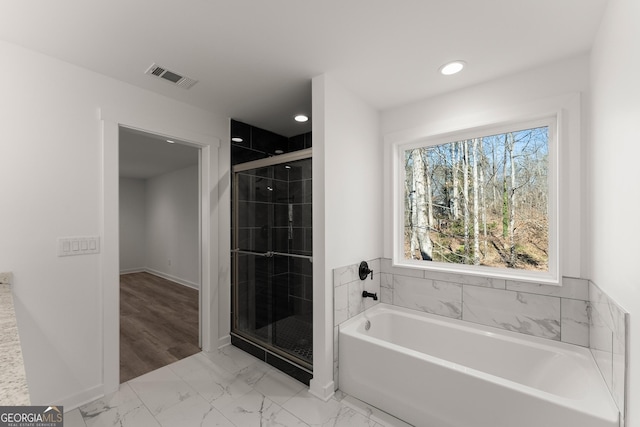 bathroom featuring visible vents, recessed lighting, a shower stall, a bath, and marble finish floor