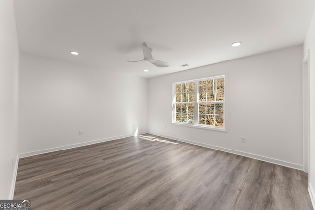 spare room with recessed lighting, baseboards, wood finished floors, and ceiling fan